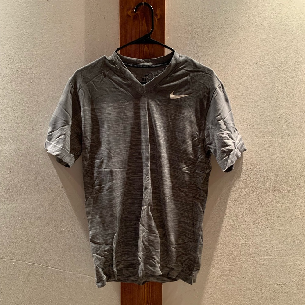 Nike Men’s Running/Training tech shirt, size medium, v neck, great condition.